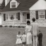 Family Standing Outside hOME