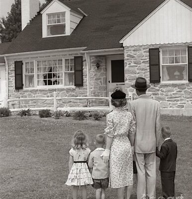 Family Standing Outside hOME