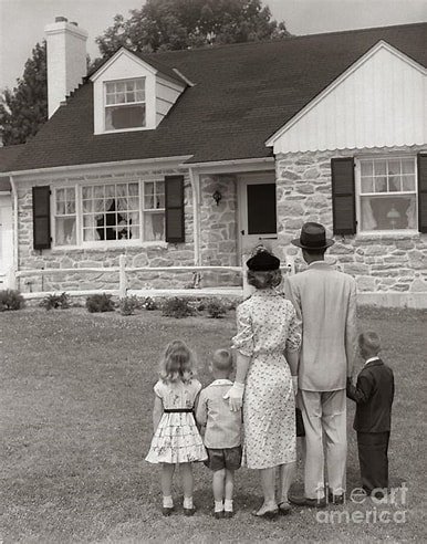 Family Standing Outside hOME